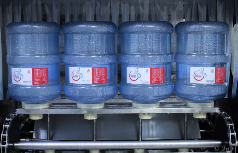 5-gallon-drinking -water-bottles -undergoing -automated -washing-and -sanitization